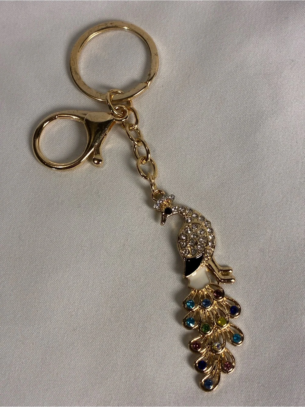 Gold Peacock Keychain with Black and Multicolor Crystal Accents